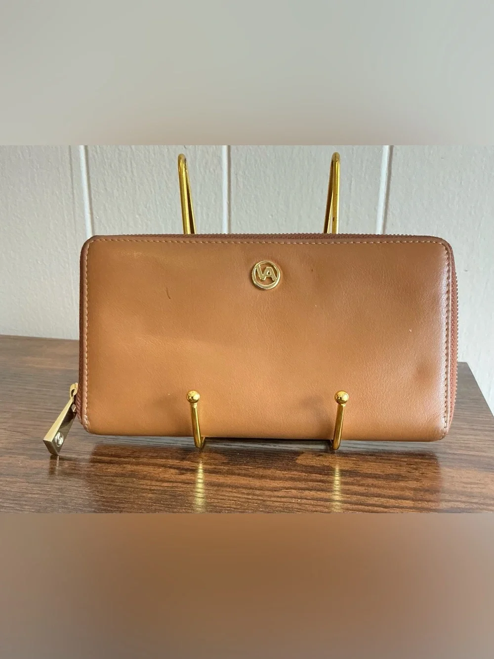 A rare vintage Adrienne Vittadini cognac color zip around leather wallet